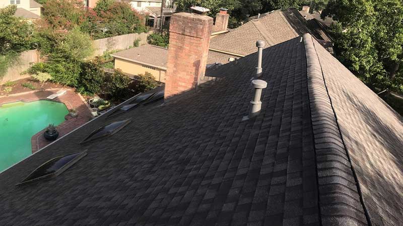 Roof repaired around skylights after wind and hail storm.