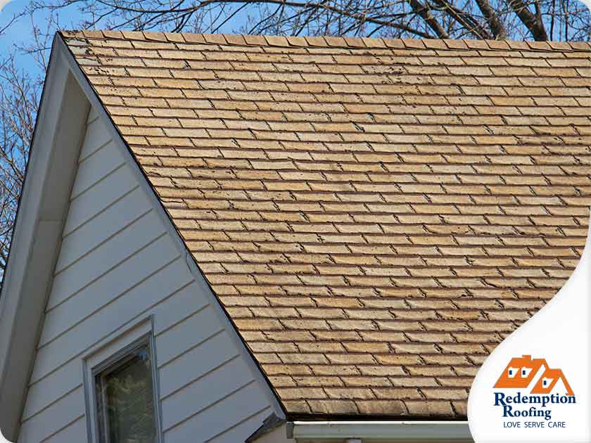 Old roof shingles will crack and split over time.