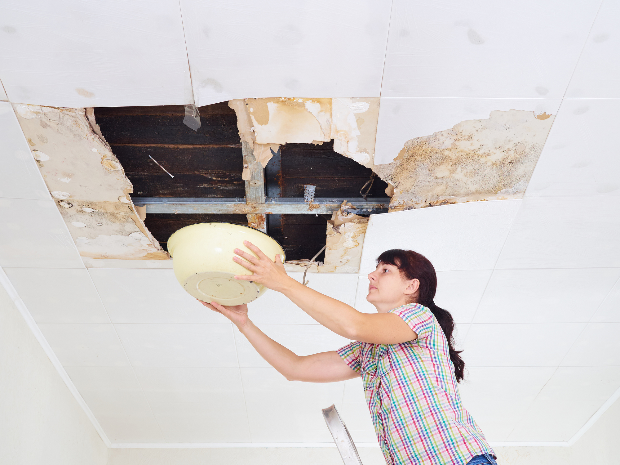 Roof is leaking and damaging the ceiling.